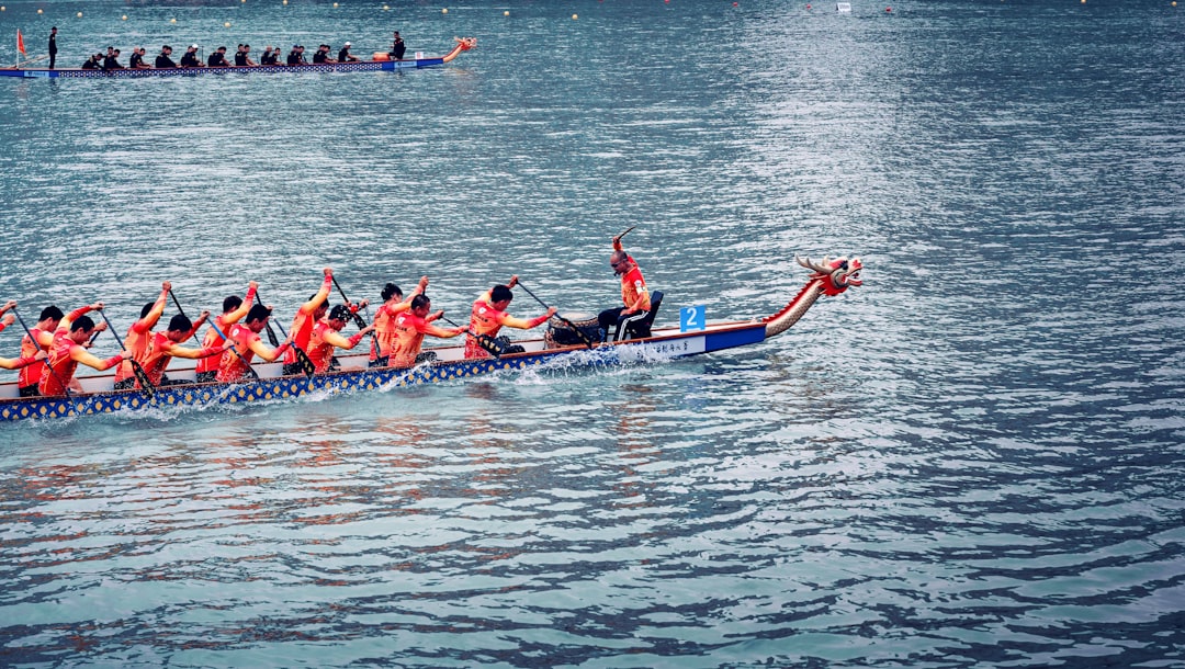 A group of friends enjoying a day on a boat, surrounded by water and nature, representing a social boating experience.