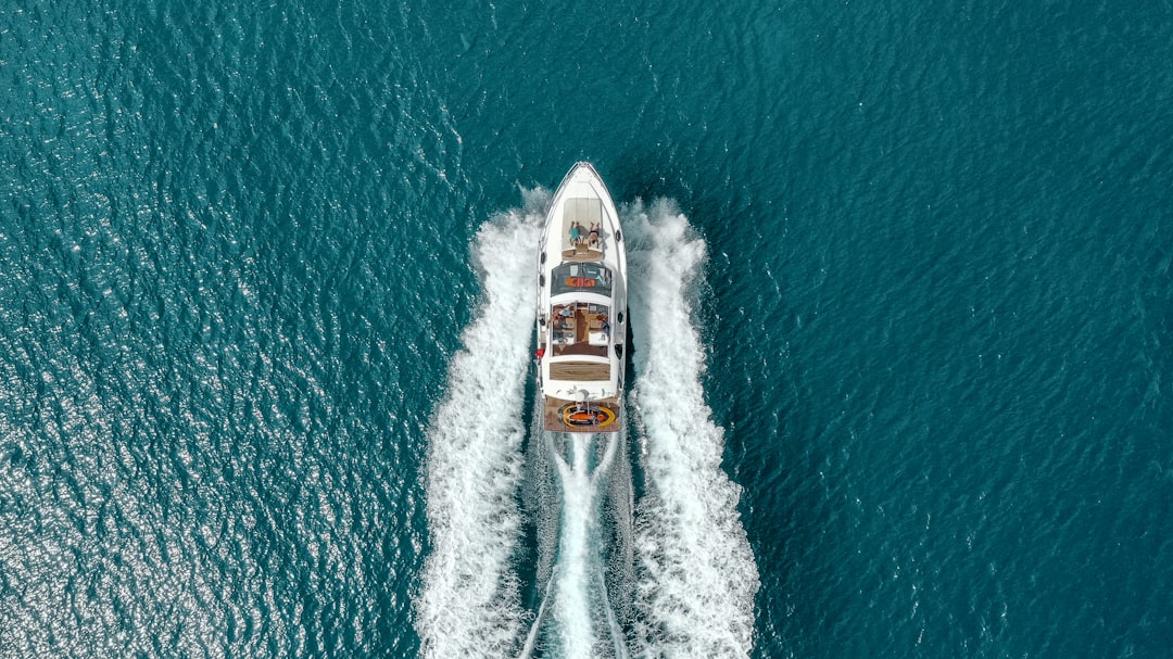 A well-equipped sailboat ready for long-distance cruising, showcasing safety gear and navigation equipment on deck.