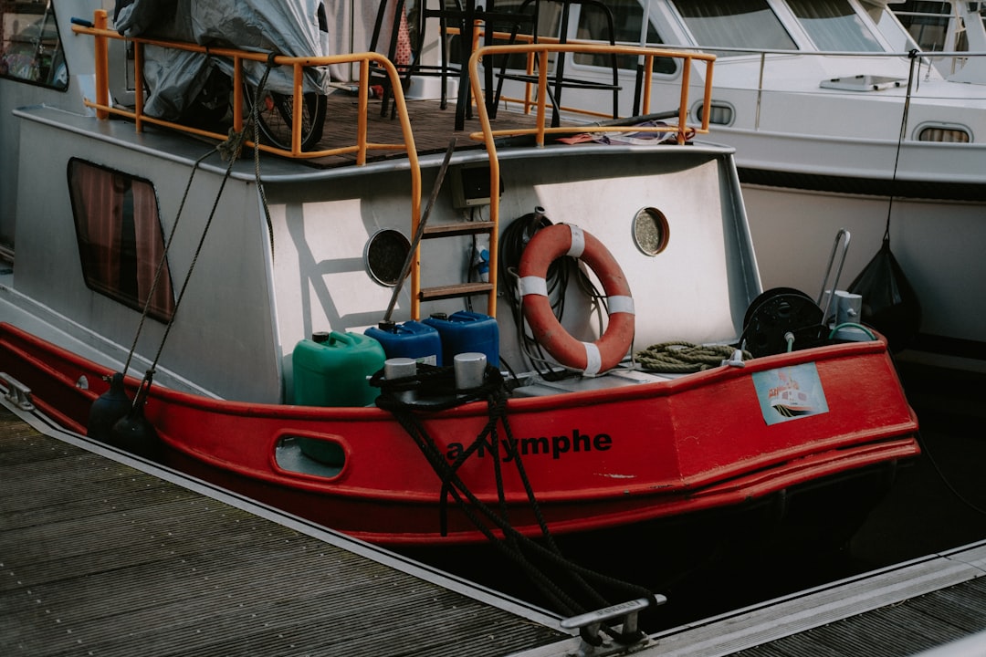 A well-prepared boat ready for a weekend adventure on the water, with essential gear and a scenic backdrop.